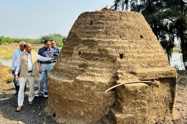 Hon'ble Vice-Chancellor Dr. Z. P. Patel along with Dr. V. R. Naik, ADR and Dr. J. M. Patel, Research Scientist, SWMRU inaugurated and lit fire to set on functioning the indigenous low cost, high efficient wood and organic matter pyrolysis Kiln to produce carbon rich stable Biochar from the ‘Prosopis juliflora’ wood at Coastal Soil Salinity Research Station, Danti on January 17, 2024