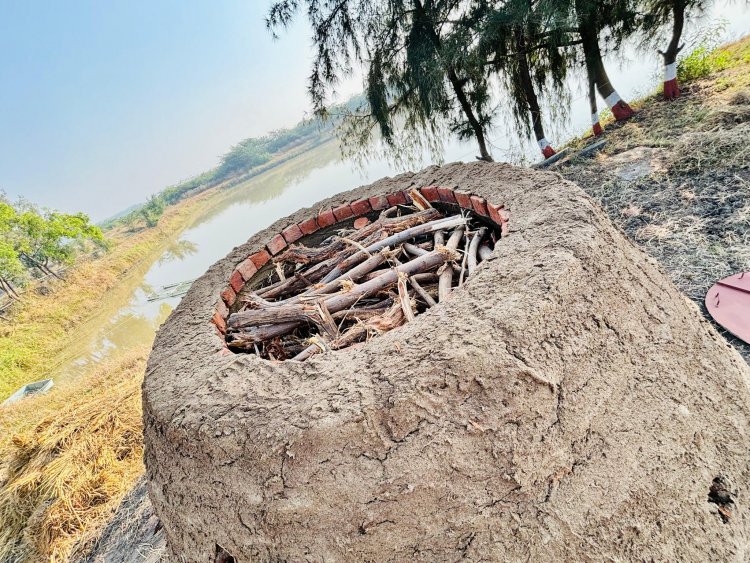 Hon'ble Vice-Chancellor Dr. Z. P. Patel along with Dr. V. R. Naik, ADR and Dr. J. M. Patel, Research Scientist, SWMRU inaugurated and lit fire to set on functioning the indigenous low cost, high efficient wood and organic matter pyrolysis Kiln to produce carbon rich stable Biochar from the ‘Prosopis juliflora’ wood at Coastal Soil Salinity Research Station, Danti on January 17, 2024