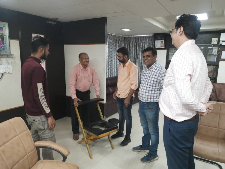 Hon'ble Vice Chancellor Dr. Z. P. Patel inaugurated a portable, multipurpose folding bamboo seat, an innovative project developed by students Mr. Hardik H. Pardava and Mr. Vishal Jotav.