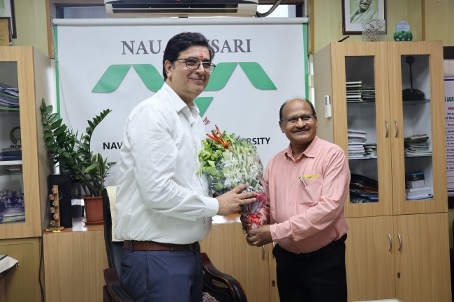 Hon'ble Vice-Chancellor Dr. Z. P. Patel congratulates Dr. T.R.Ahlawat