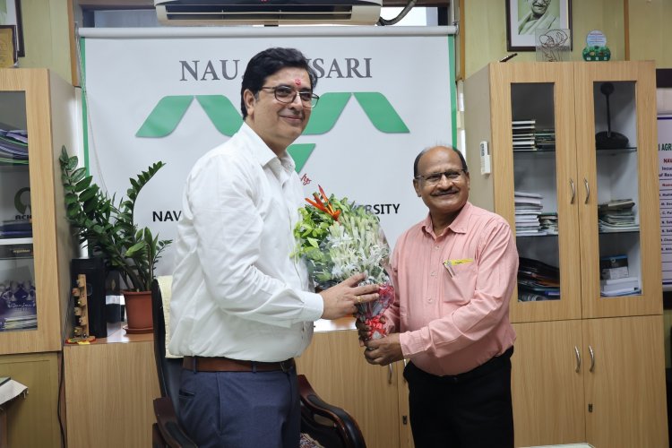 Hon'ble Vice-Chancellor Dr. Z. P. Patel congratulates Dr. T.R.Ahlawat 