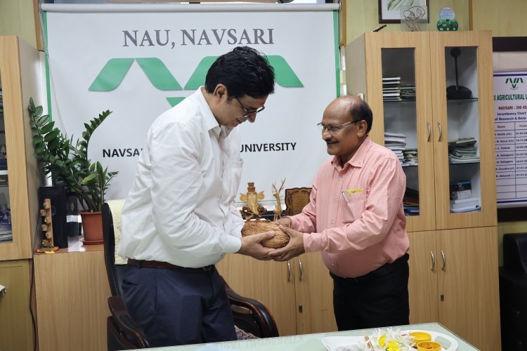 Hon'ble Vice-Chancellor Dr. Z. P. Patel congratulates Dr. T.R.Ahlawat 